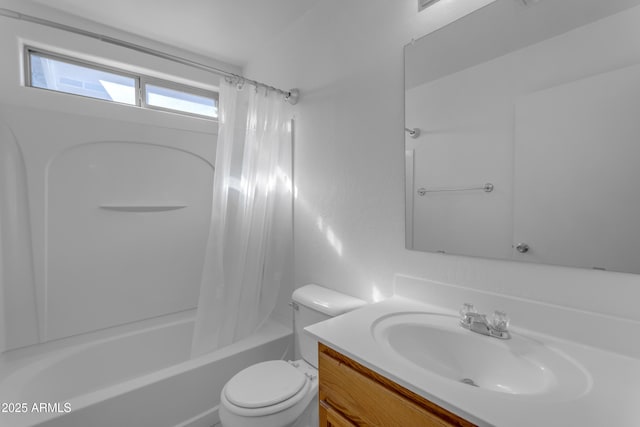 full bathroom featuring shower / tub combo, vanity, and toilet