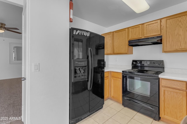 kitchen featuring light tile patterned flooring, ceiling fan, light brown cabinets, and black appliances