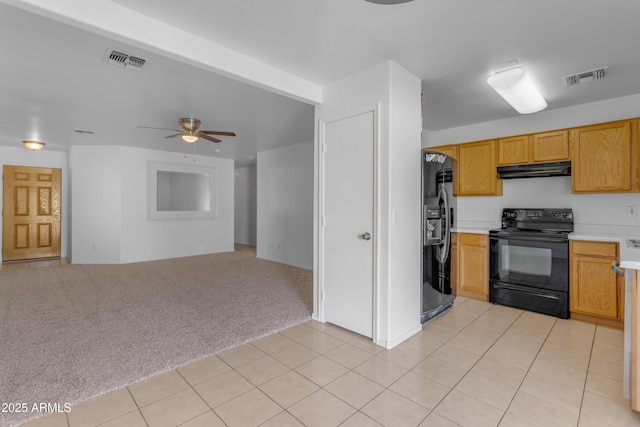 kitchen with light colored carpet, ceiling fan, and black appliances