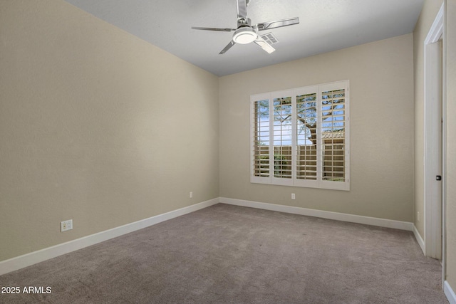 unfurnished bedroom with carpet, baseboards, and a ceiling fan