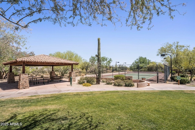 view of property's community with a gazebo and a tennis court