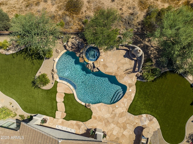 view of pool featuring a patio area