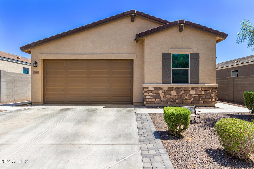 view of front of property featuring a garage