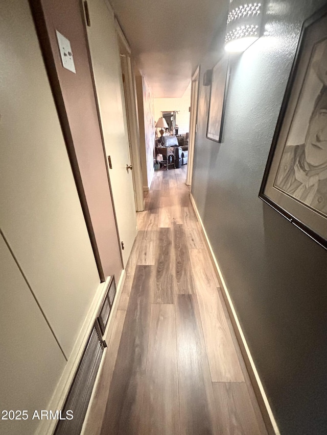 361 W Placer St, Ajo, AZ 85321 - hallway featuring wood finished floors