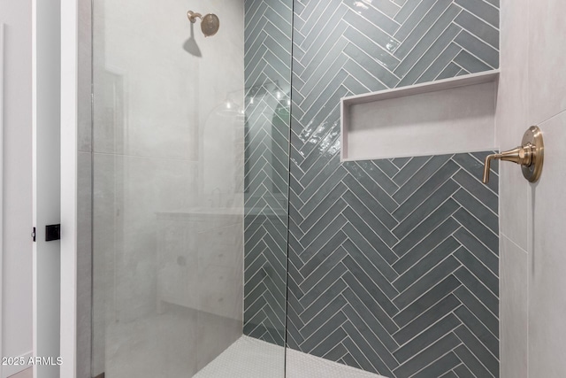 bathroom with a shower stall