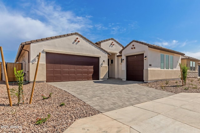 mediterranean / spanish-style house featuring a garage