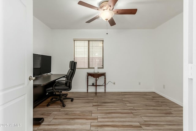 office space with ceiling fan