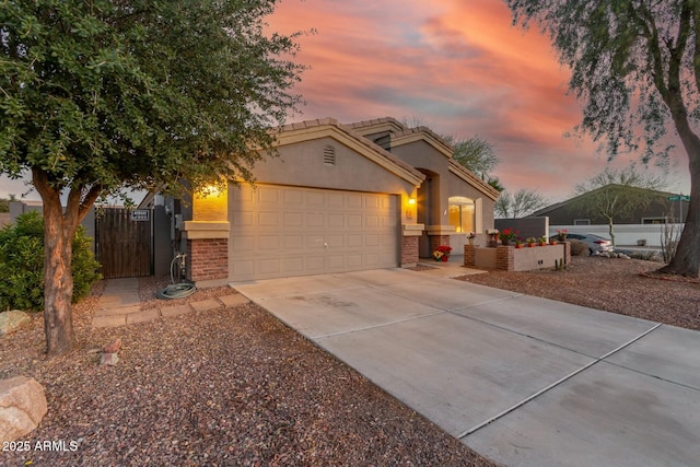 view of front of home with a garage