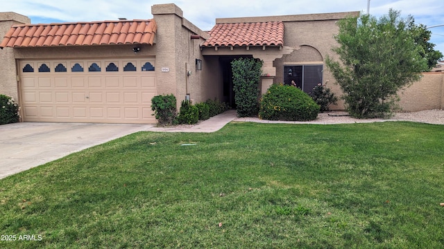 mediterranean / spanish house with a tile roof, stucco siding, concrete driveway, an attached garage, and a front yard