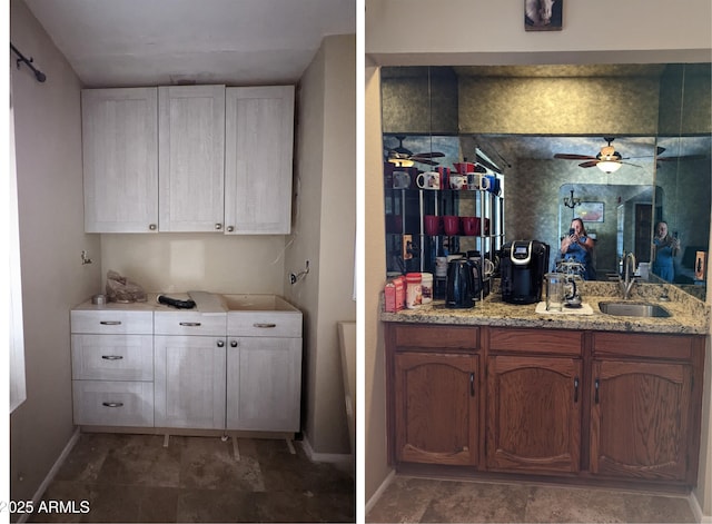 bar featuring a sink, a ceiling fan, and baseboards