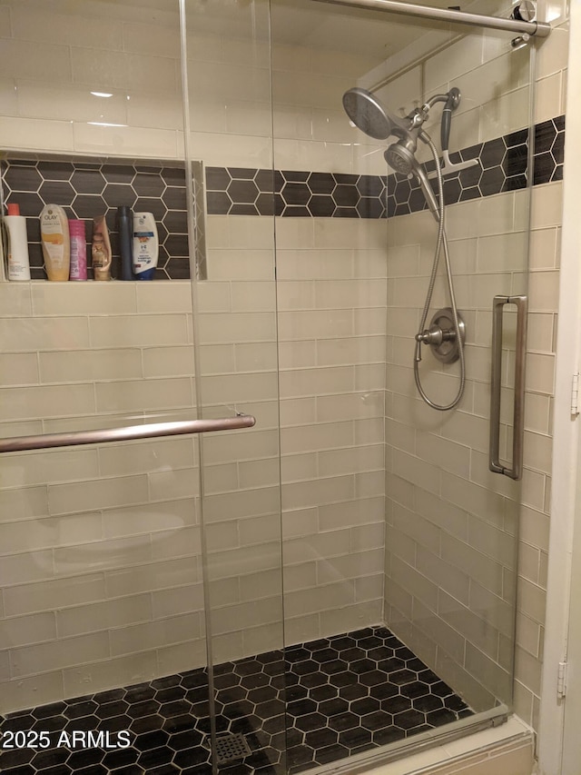 full bath featuring a stall shower