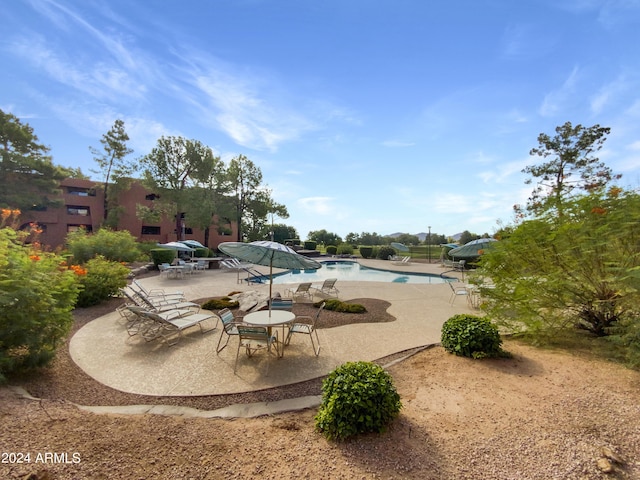 pool featuring a patio