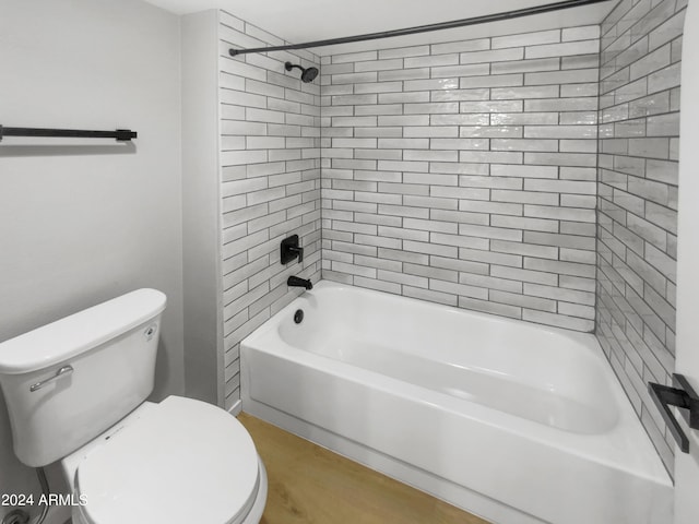 full bathroom featuring shower / tub combination and toilet