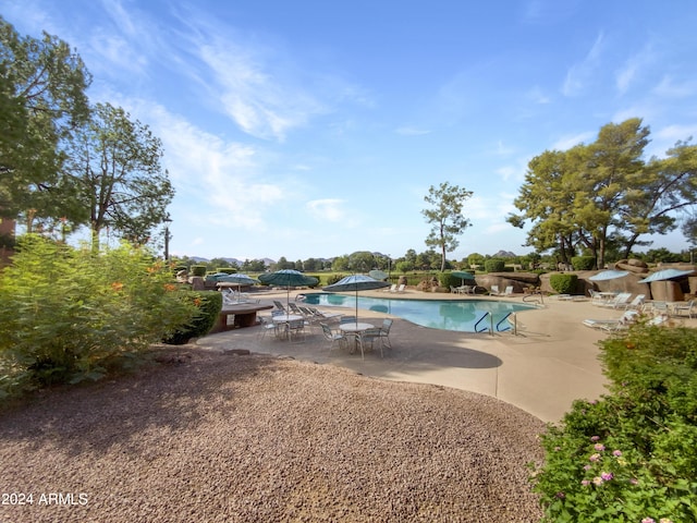 community pool featuring a patio