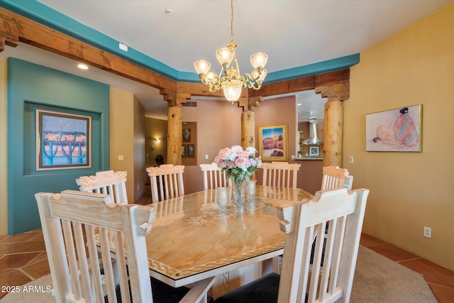 25483 N Wrangler Rd, Scottsdale, AZ 85255 - dining area featuring tile patterned floors, a chandelier, and ornate columns