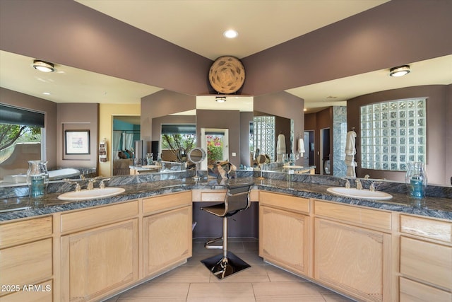 25483 N Wrangler Rd, Scottsdale, AZ 85255 - full bathroom featuring two vanities and tile patterned floors