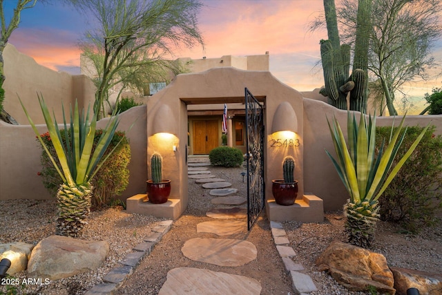 25483 N Wrangler Rd, Scottsdale, AZ 85255 - view of exterior entry with stucco siding