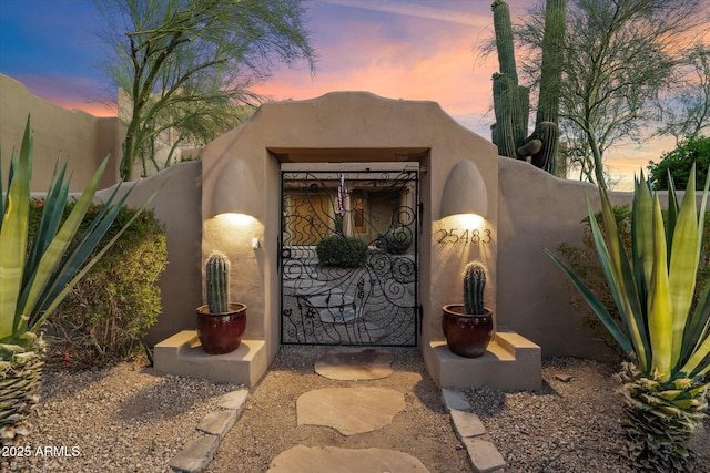 25483 N Wrangler Rd, Scottsdale, AZ 85255 - view of exterior entry with a gate and fence