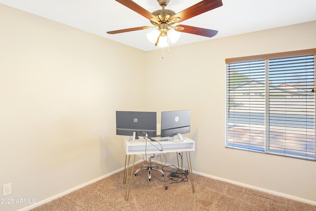 office area featuring light colored carpet and ceiling fan