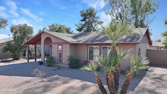 view of front of property with a carport