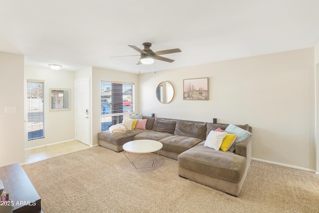 living room with light carpet and ceiling fan