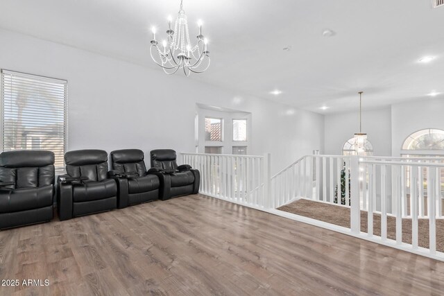 1442 W Laurel Ave, Gilbert, AZ 85233 - home theater room with a chandelier, wood finished floors, and recessed lighting