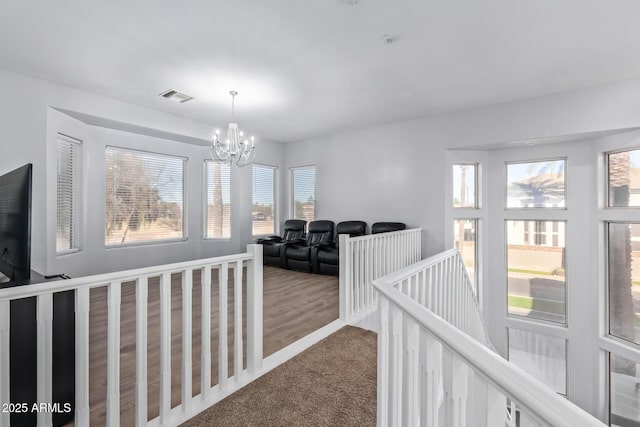 1442 W Laurel Ave, Gilbert, AZ 85233 - corridor with a chandelier, carpet floors, and an upstairs landing