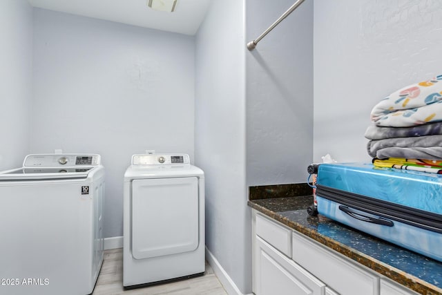 1442 W Laurel Ave, Gilbert, AZ 85233 - laundry area featuring separate washer and dryer, light wood-style flooring, and baseboards