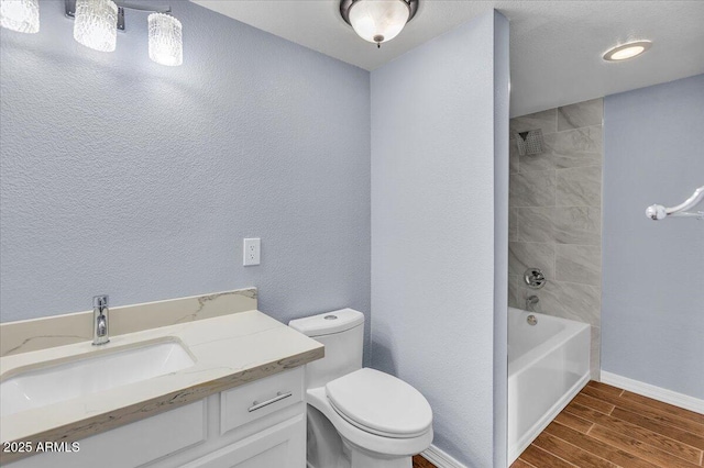 2954 N Oregon St Unit 6, Chandler, AZ 85225 - bathroom featuring wood finished floors, vanity, and bathtub / shower combination