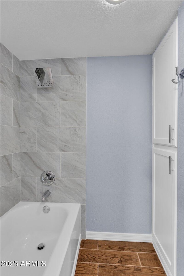 2954 N Oregon St Unit 6, Chandler, AZ 85225 - bathroom with shower / tub combination, wood finished floors, and a textured ceiling