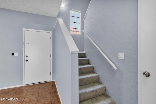 2954 N Oregon St Unit 6, Chandler, AZ 85225 - stairway featuring tile patterned floors and a textured wall