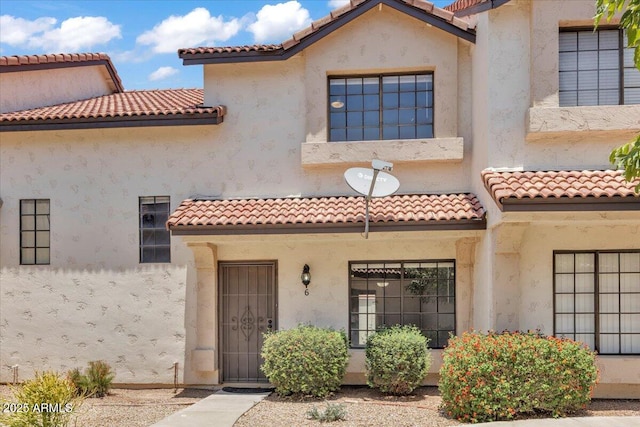 2954 N Oregon St Unit 6, Chandler, AZ 85225 - view of front facade with a tile roof and stucco siding