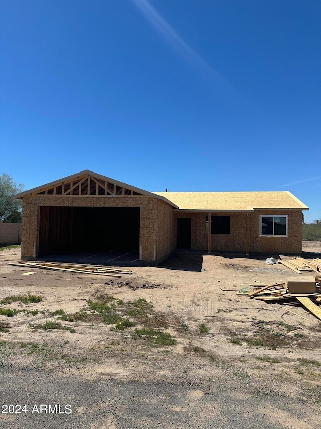 property in mid-construction featuring a garage