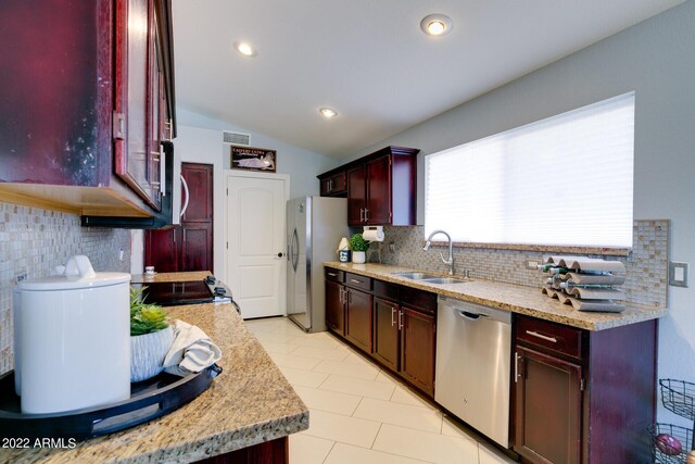 living area with ceiling fan, light tile patterned floors, and plenty of natural light