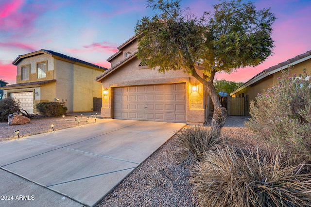 view of front of home with a garage