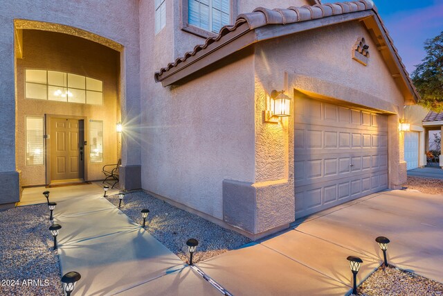 view of home's exterior featuring a garage