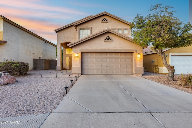 view of property featuring a garage