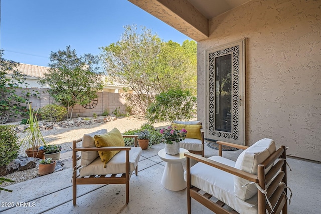 view of patio with fence