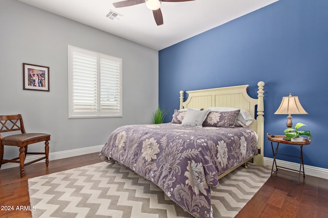 bedroom with hardwood / wood-style flooring and ceiling fan