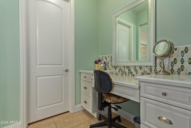 home office with light tile patterned floors