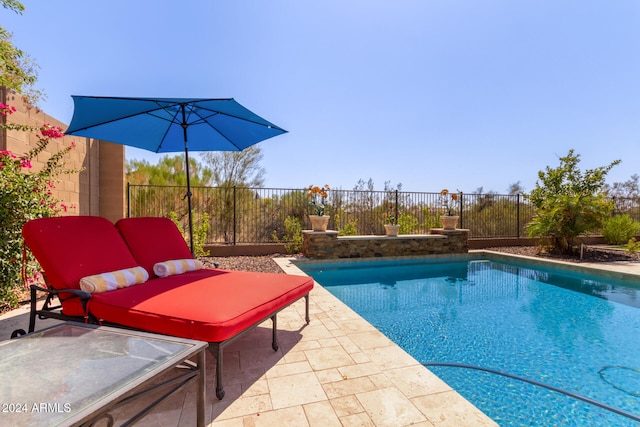 view of pool featuring a patio area