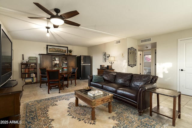 living room featuring ceiling fan