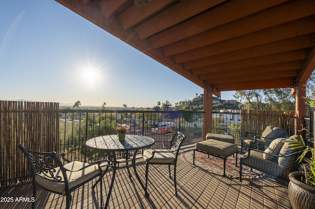 wooden deck featuring outdoor lounge area