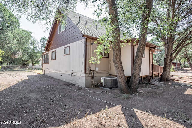 view of home's exterior featuring cooling unit