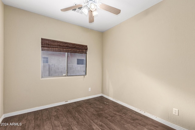 empty room featuring ceiling fan and hardwood / wood-style flooring