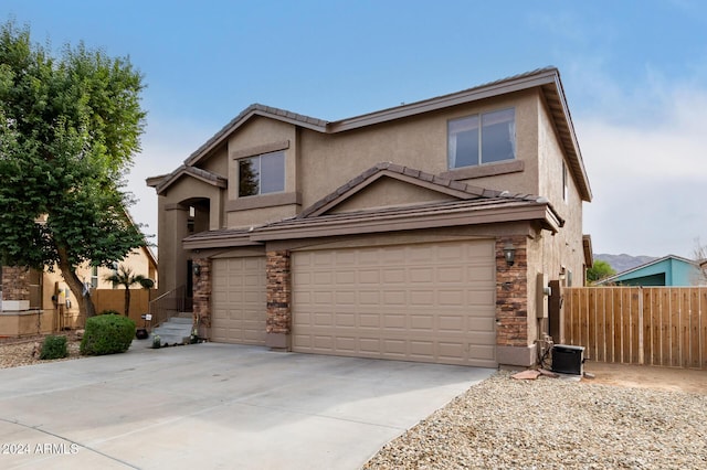 front of property featuring a garage