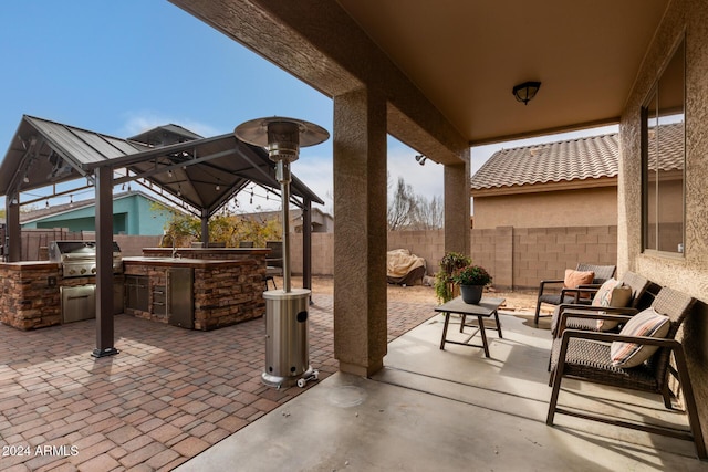 view of patio / terrace featuring an outdoor living space, area for grilling, and grilling area