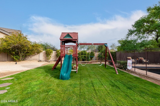 view of play area featuring a yard