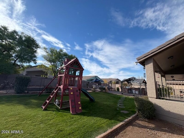 view of play area featuring a yard