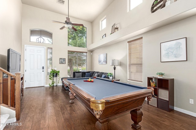 playroom featuring a towering ceiling, dark hardwood / wood-style floors, ceiling fan, and billiards